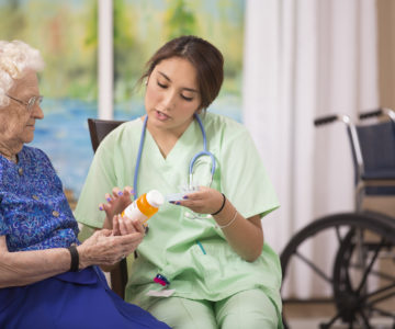 100-Year-Old woman and her home healthcare nurse.