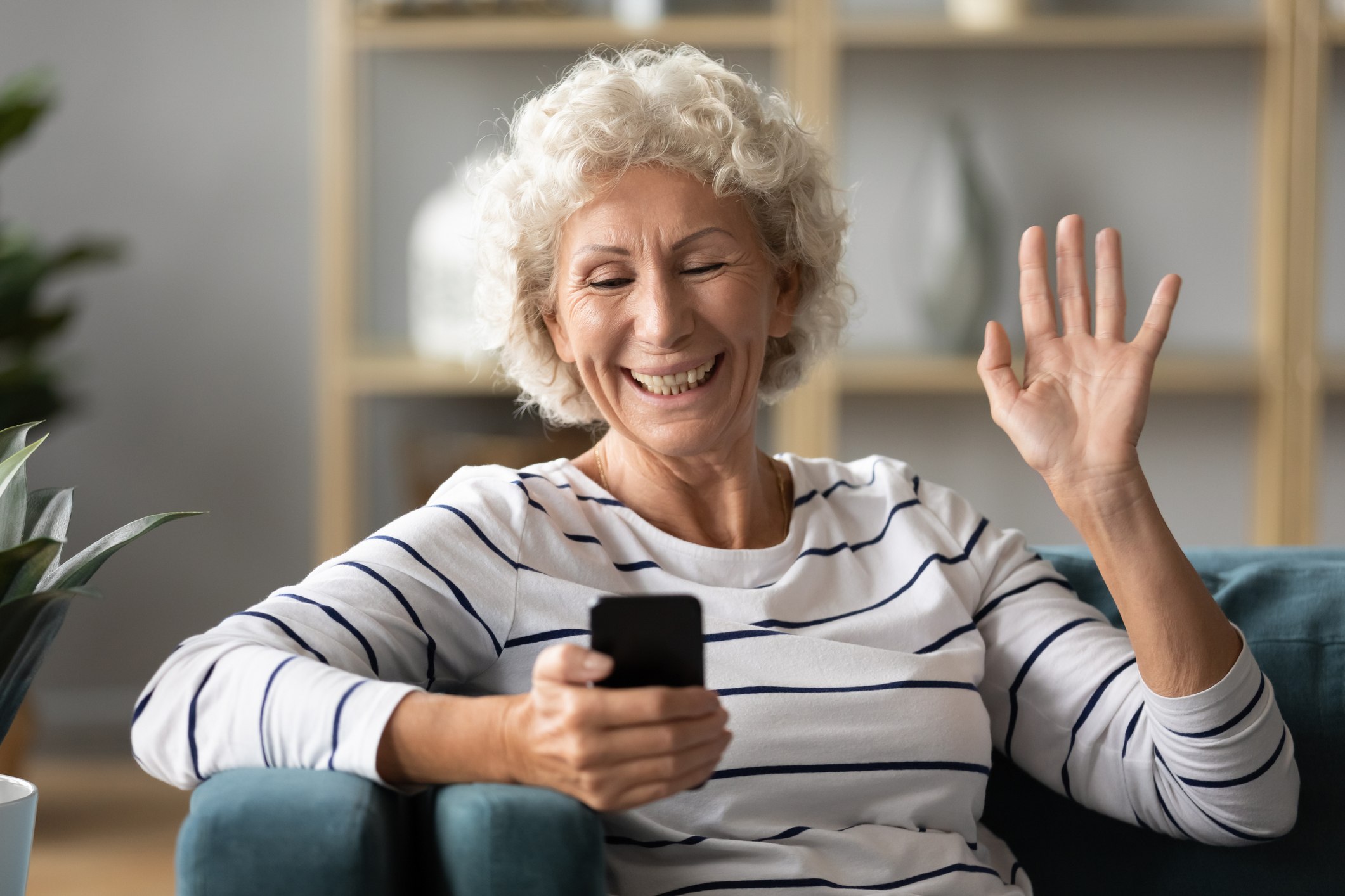 Senior woman using a video app on her smartphone