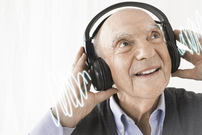 senior man wearing headphones