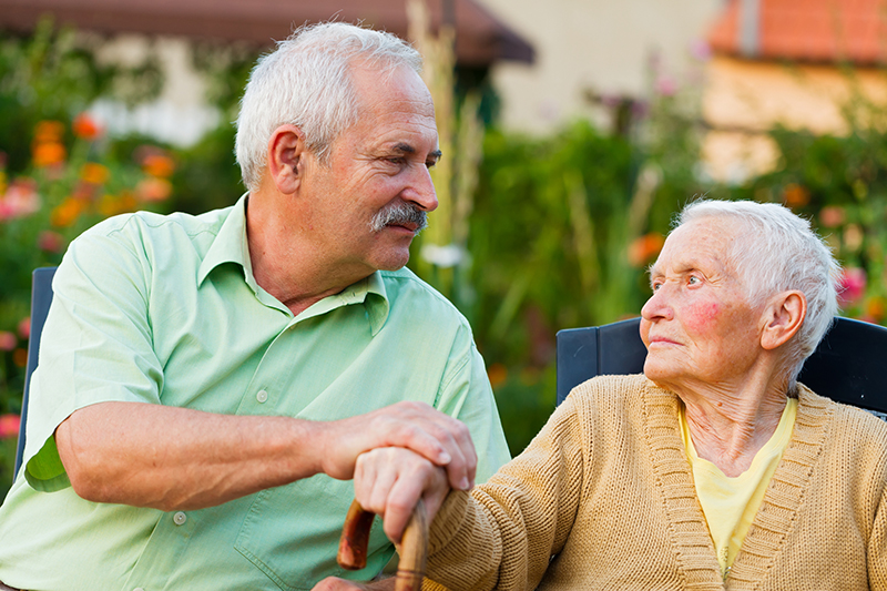family caregiver with senior loved one